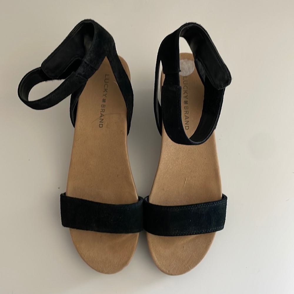 Lucky Brand black wedge cork sandal.